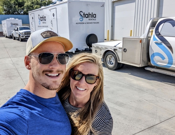 Grant and Erin Stahla with a Stahla restroom trailer